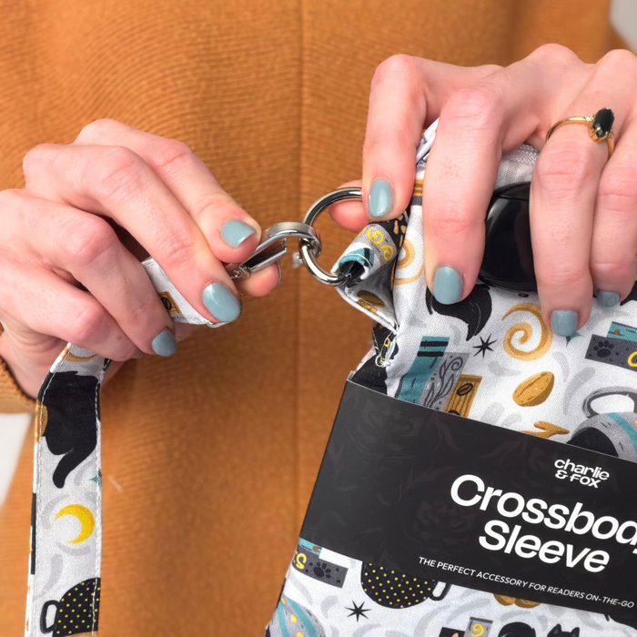 Feline Fables crossbody sleeve